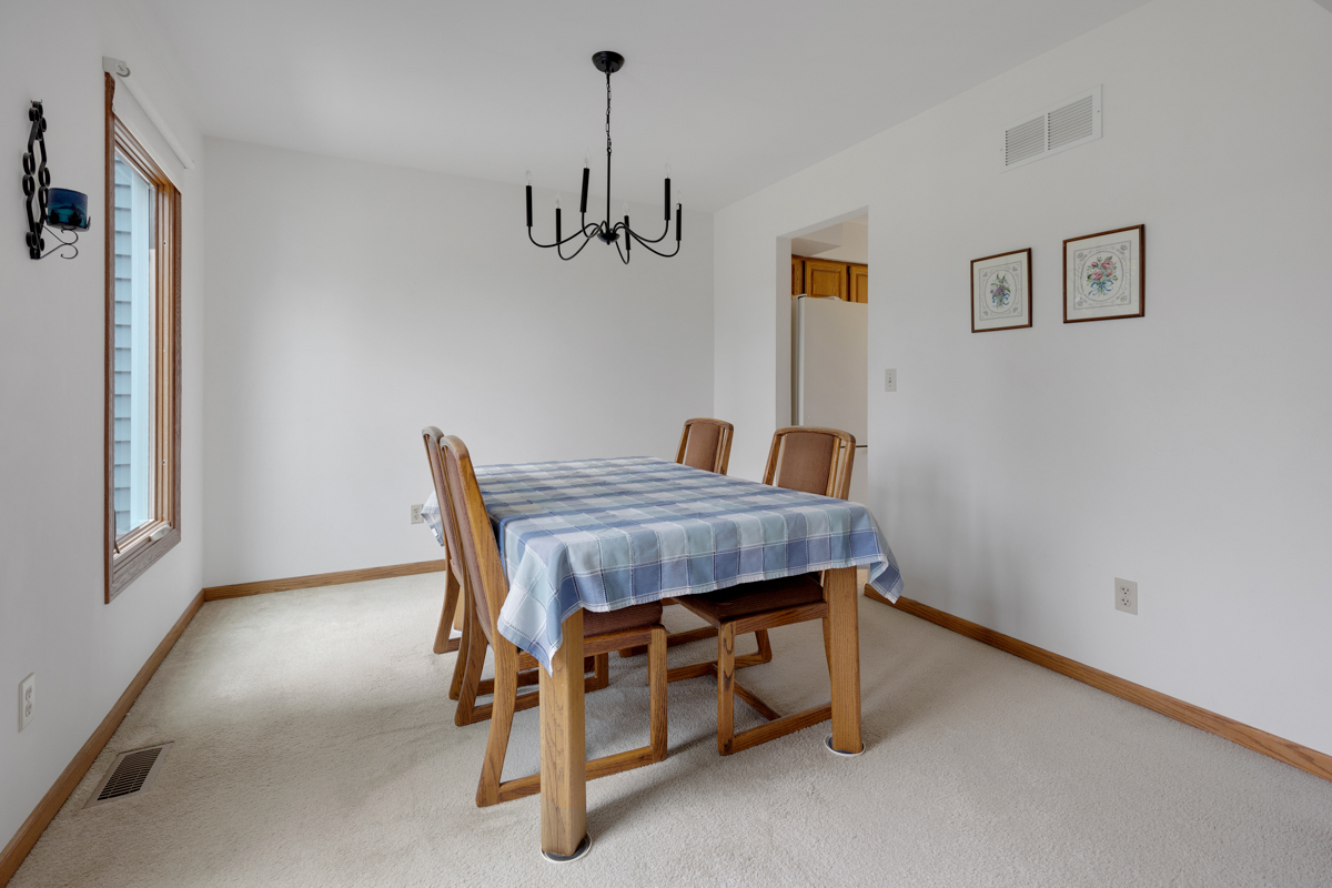 43W330 Main Street Road Elburn, IL 60119 - Photo 12 of 34 a dining room with a table and chairs