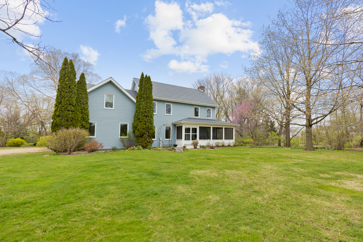 43W330 Main Street Road Elburn, IL 60119 - Photo 2 of 34 a front view of a house with a garden