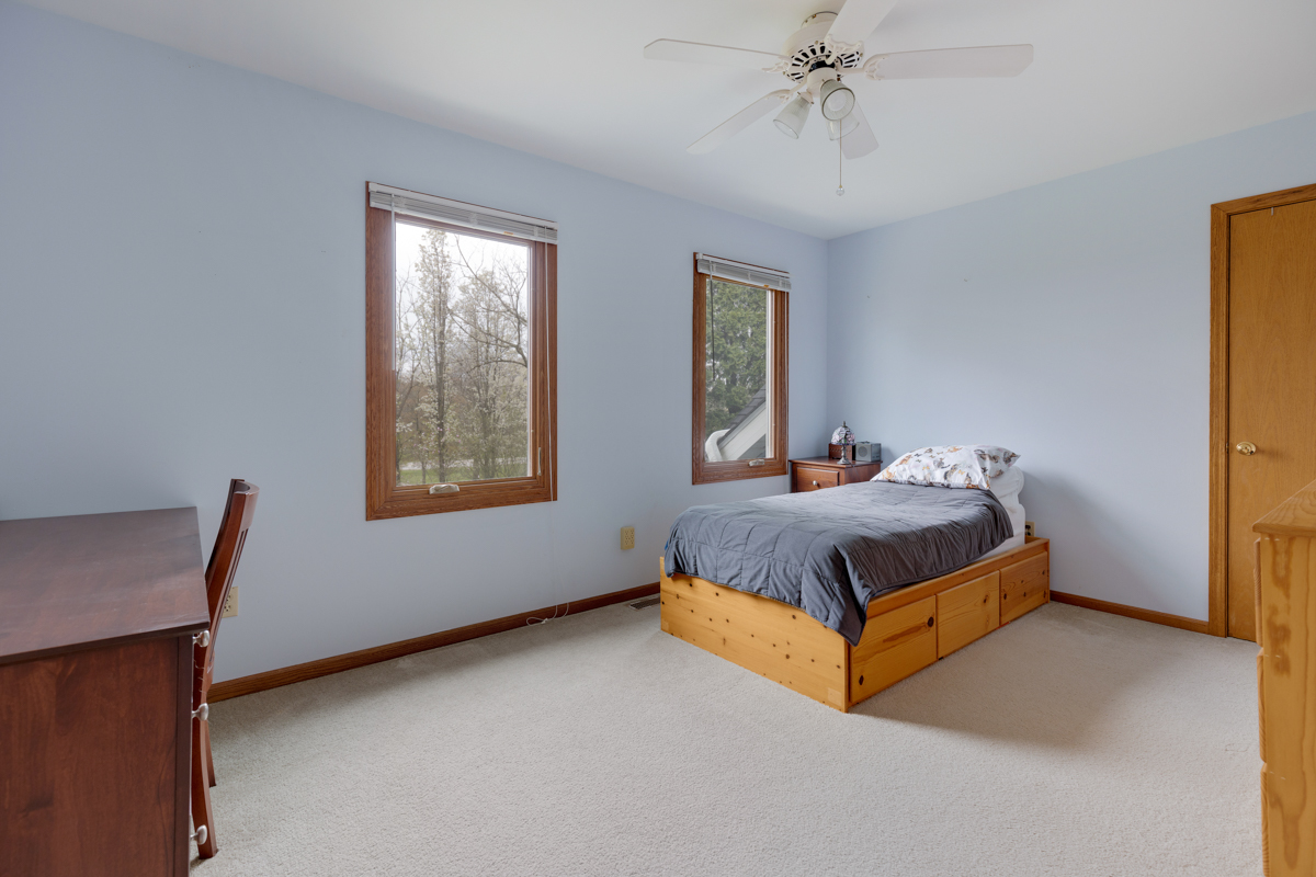 43W330 Main Street Road Elburn, IL 60119 - Photo 24 of 34 a bedroom with a bed and window