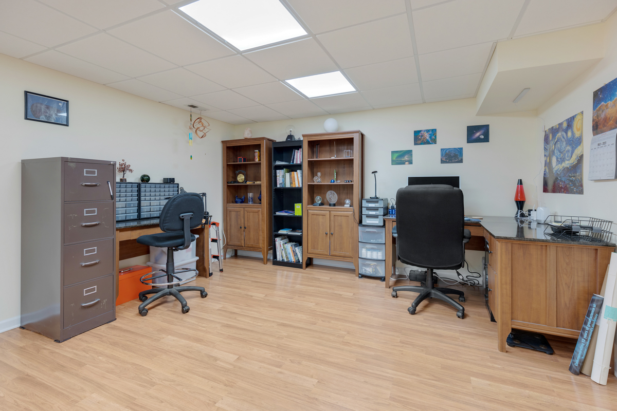 43W330 Main Street Road Elburn, IL 60119 - Photo 30 of 34 a view of a workspace with furniture and a bedroom