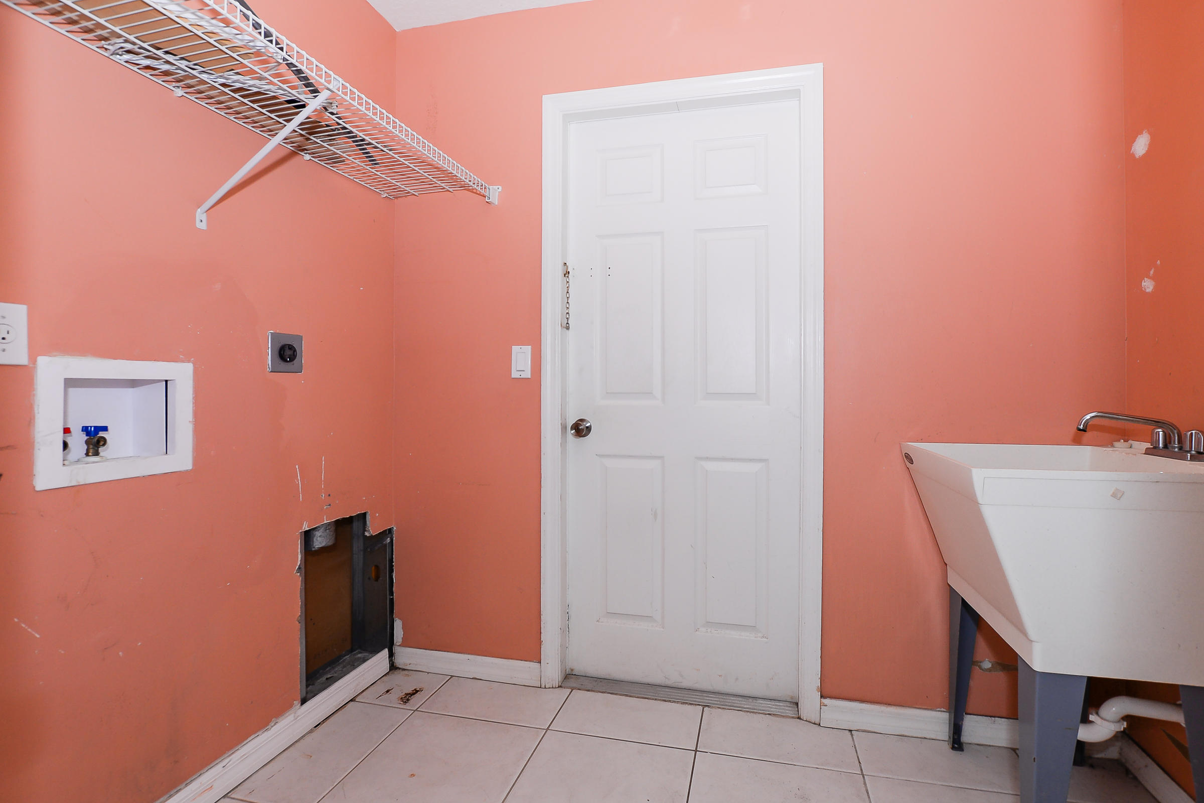 509 Southwest Cherryhill Road Port St. Lucie, FL 34953 - Photo 20 of 24 laundry