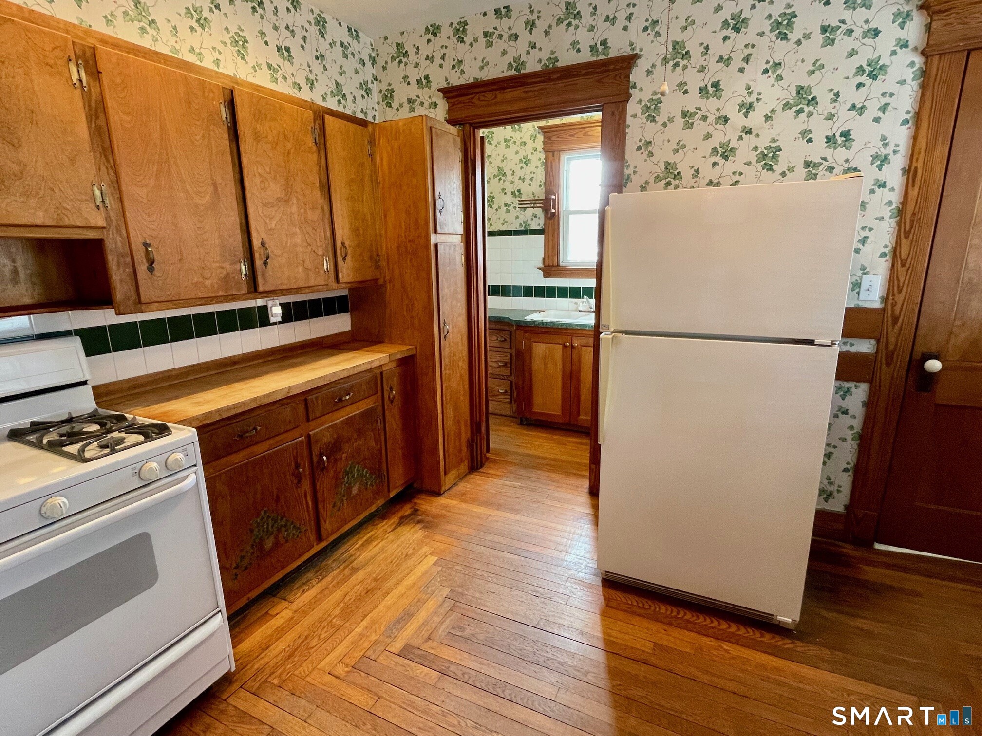 36 Quentin Street Hamden, CT 06517 - Photo 11 of 28 Kitchen offers hardwood flooring