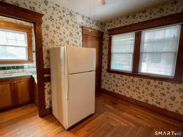 a bathroom with a sink and a window