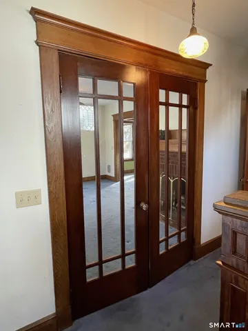 a view of elevator with hallway