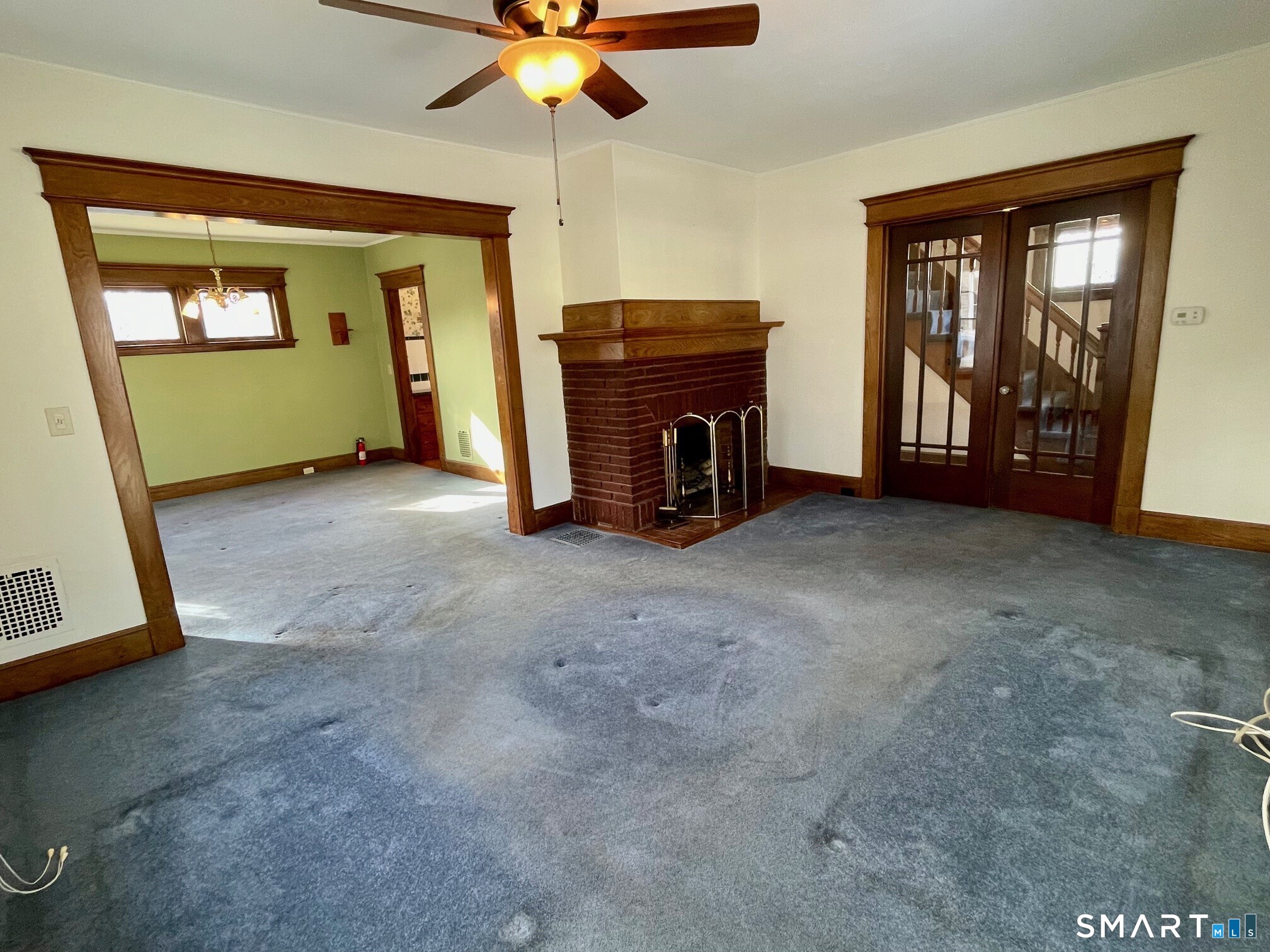 36 Quentin Street Hamden, CT 06517 - Photo 6 of 28 Living room looking toward the dining room