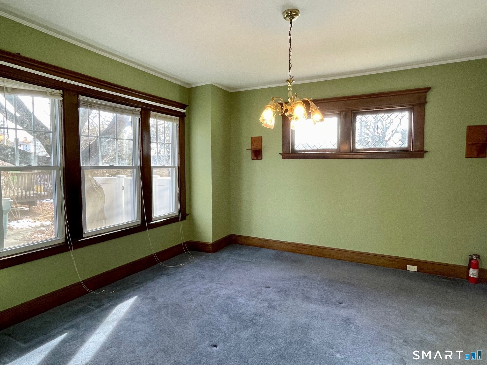 36 Quentin Street Hamden, CT 06517 - Photo 9 of 28 Dining room is spacious and there is hardwood under the carpet