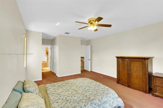 a bathroom with a sink double vanity and a mirror