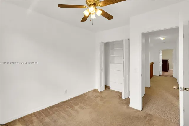 an aerial view of residential house with outdoor space and street view