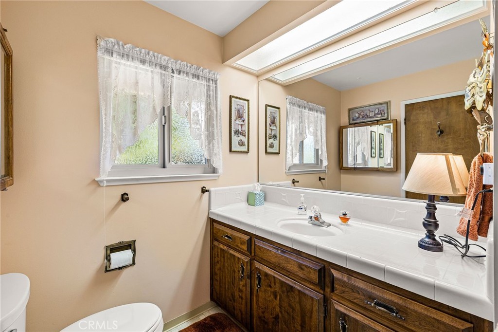 5770 Ingalls Road Paradise, CA 95969 - Photo 31 of 63 a bathroom with a sink and a mirror