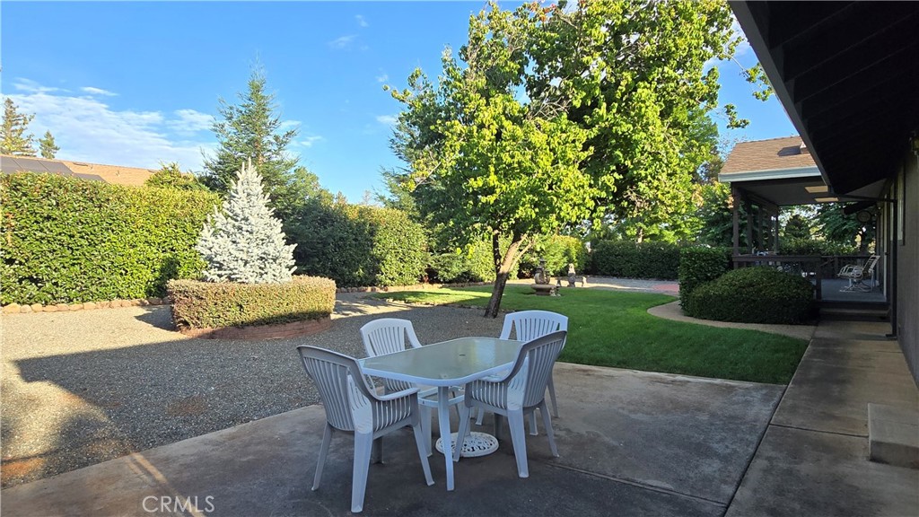 5770 Ingalls Road Paradise, CA 95969 - Photo 50 of 63 a view of a chairs and table in backyard