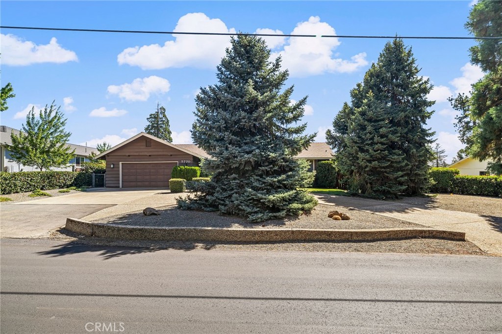 5770 Ingalls Road Paradise, CA 95969 - Photo 51 of 63 a front view of a house with a yard