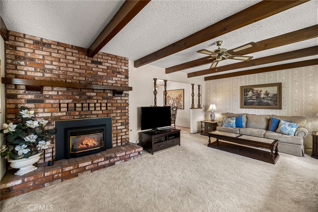 5770 Ingalls Road Paradise, CA 95969 - Photo 6 of 63 a living room with furniture and a fireplace