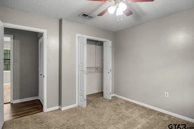 an empty room with a bathroom
