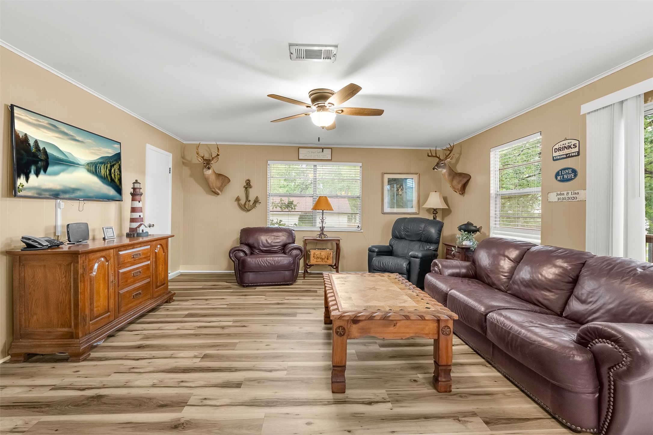 439 Lakeview Harbor Onalaska, TX 77360 - Photo 10 of 43 a living room with furniture and a large window