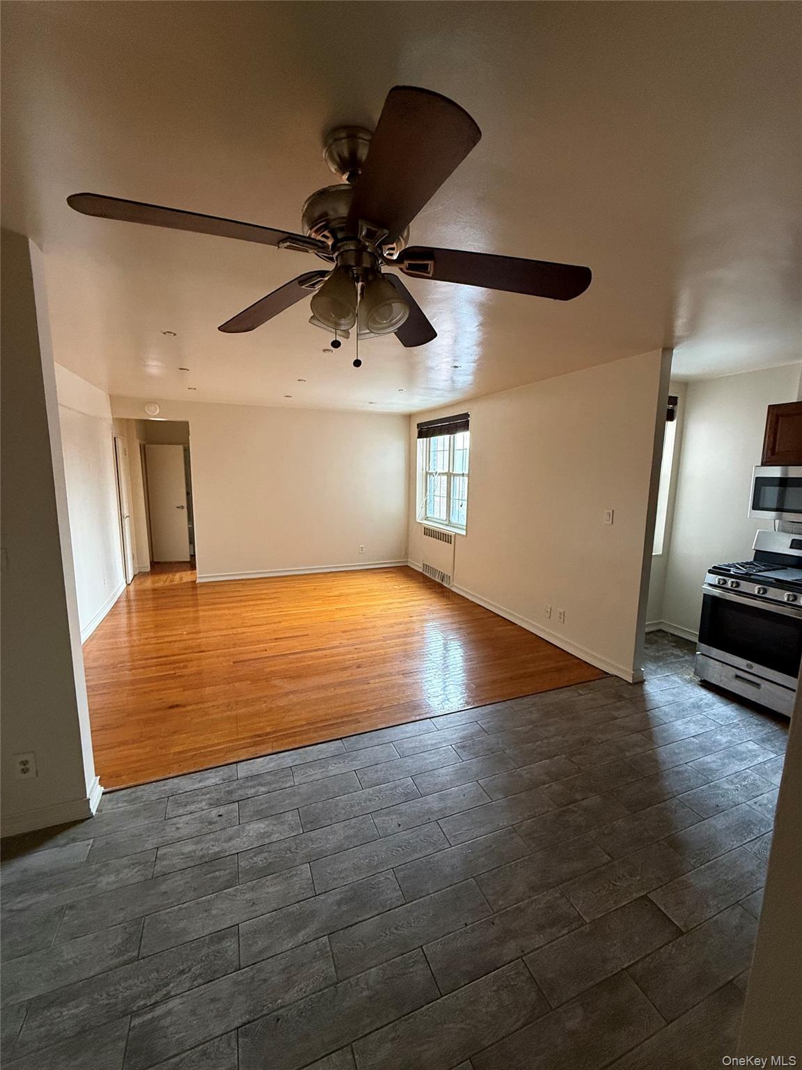 770 Bronx River Road, Unit A41 Yonkers, NY 10708 - Photo 6 of 10 a view of a livingroom with wooden floor