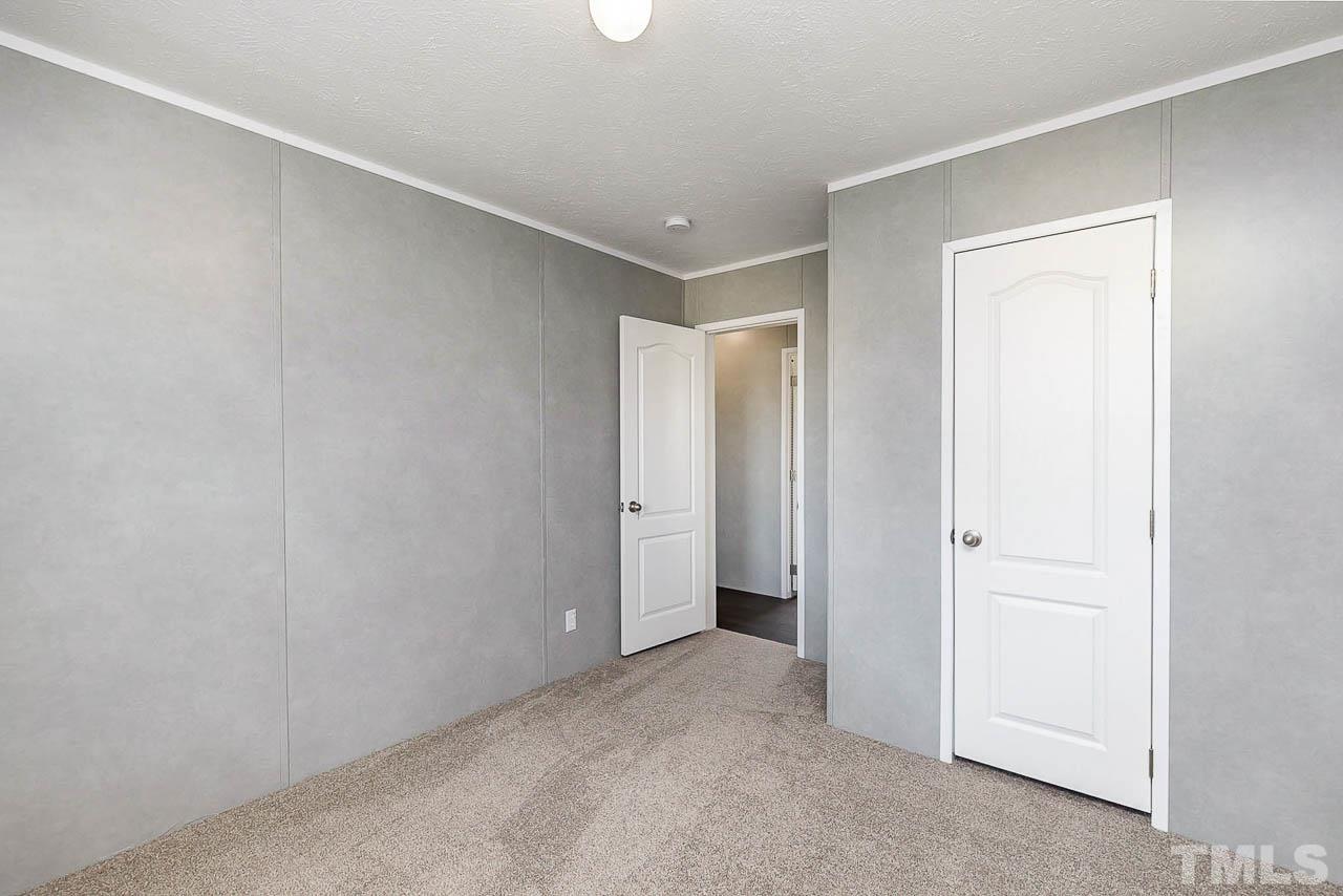 34 Ruddy Duck Lane Pine Level, NC 27576 - Photo 12 of 17 a view of an empty room