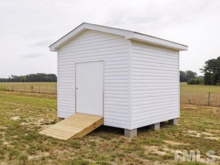 34 Ruddy Duck Lane Pine Level, NC 27576 - Photo 17 of 17 a view of a backyard of the house