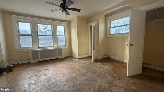an empty room with windows