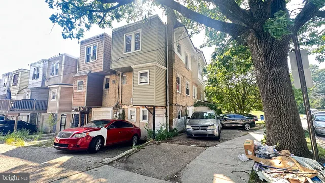 a cars parked in front of a house