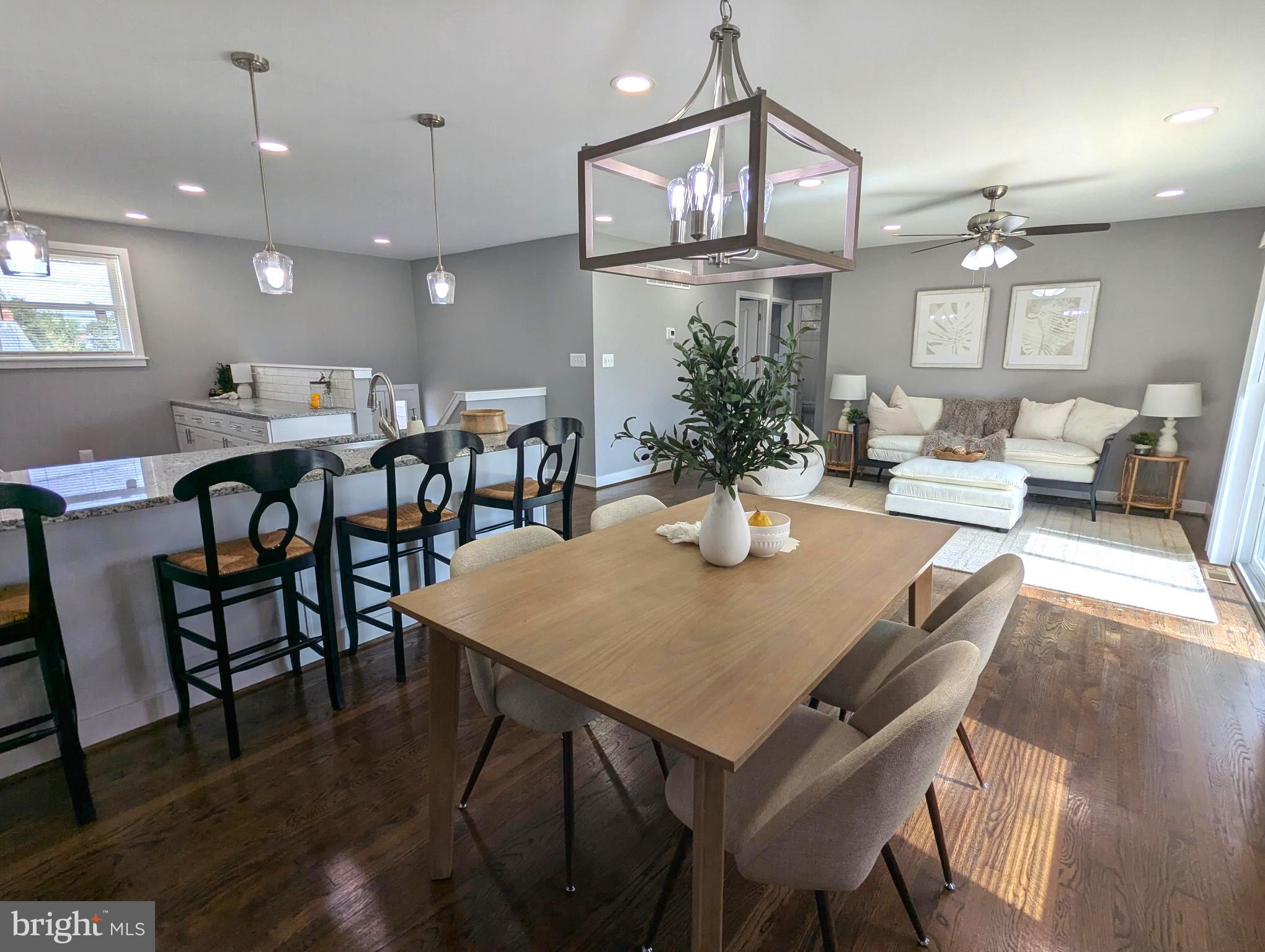 169 Dale Road Pasadena, MD 21122 - Photo 6 of 27 Sundrenched Living and Dining Areas