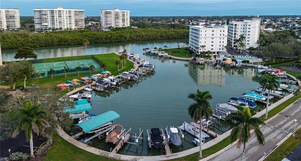 5 Bluebill Avenue, Unit 305 405 Naples, FL 34108 - Photo 26 of 30 a view of a lake from a balcony
