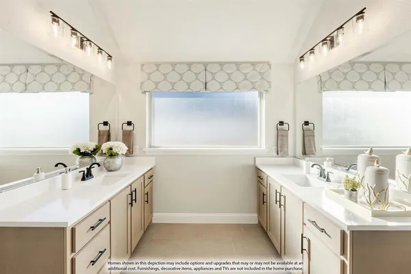 a bathroom with a sink a mirror and a window