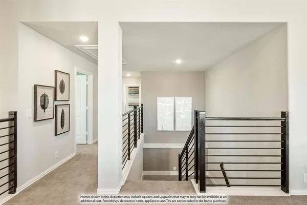 a view of staircase with white walls
