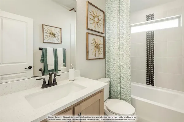 a bathroom with a sink a toilet and a bathtub