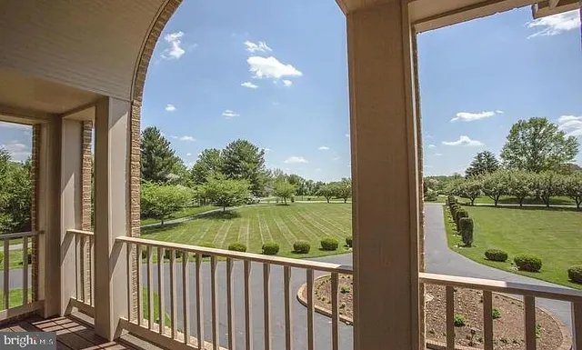 a view of a balcony with lake view