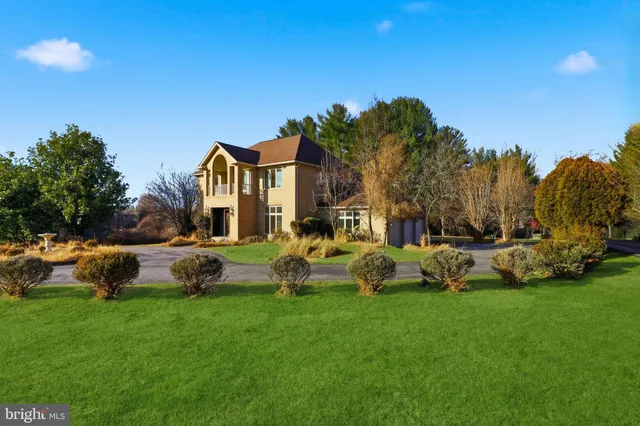 a front view of house with yard