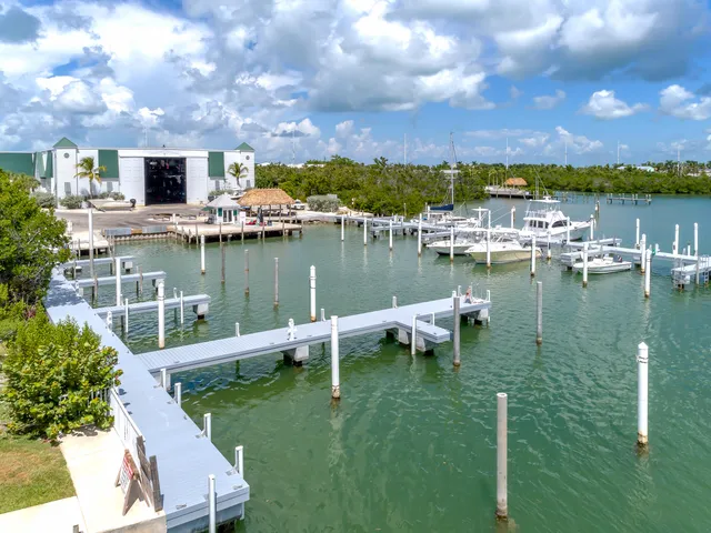 a view of a lake with a house in the background