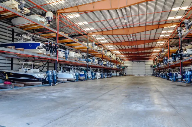 a view of an empty room with storage