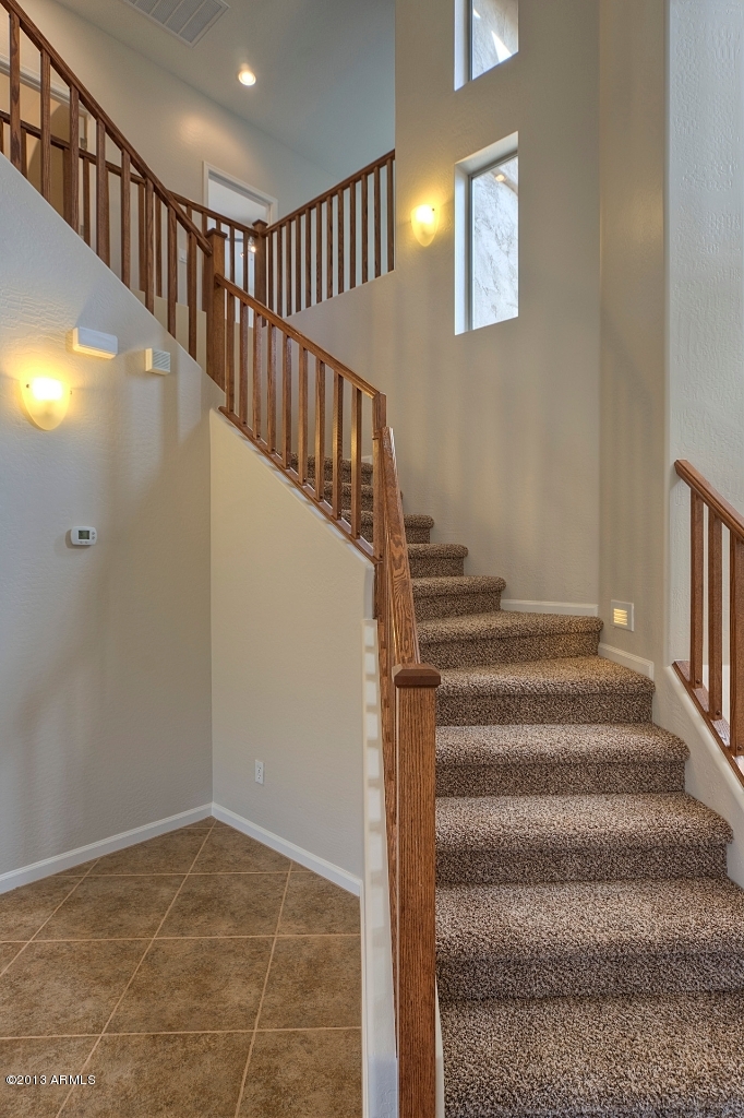 5428 West Red Bird Road Phoenix, AZ 85083 - Photo 23 of 27 Stained Oak Railing