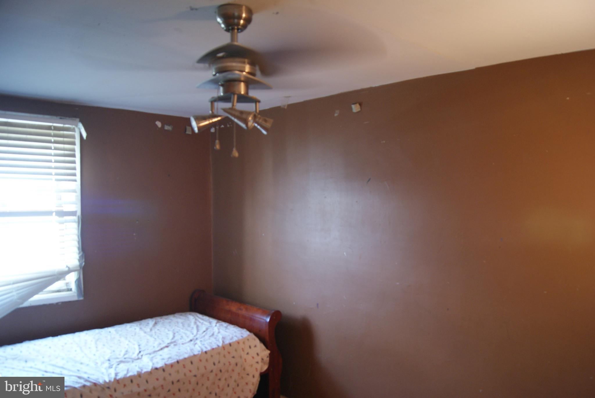 735 Grant Road Folcroft, PA 19032 - Photo 47 of 57 Cozy room with warm brown walls.