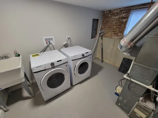 a utility room with dryer and washer
