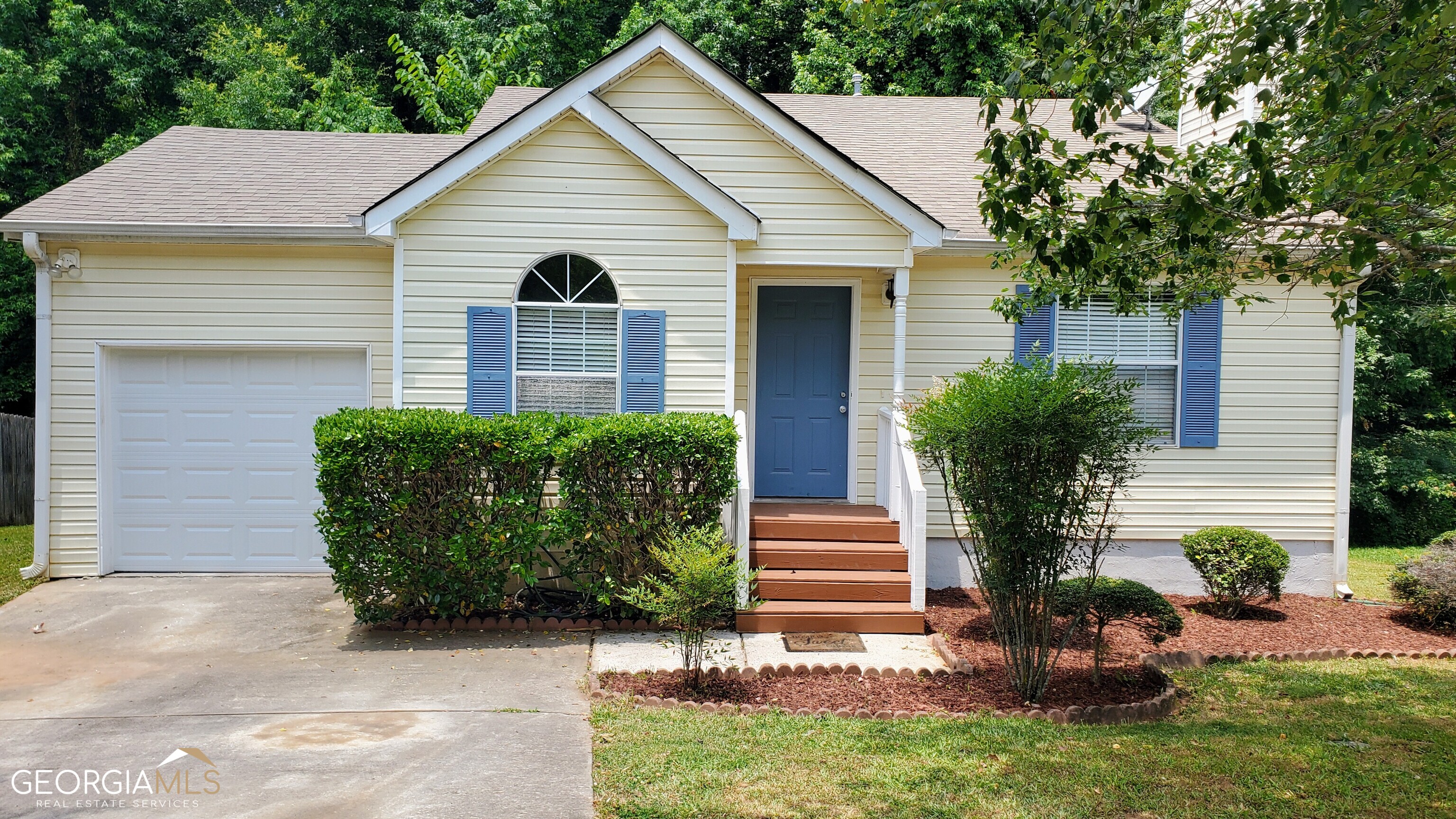 169 Brandon Ridge Circle Stockbridge, GA 30281 - Photo 1 of 1 a view of a house with a yard and plants