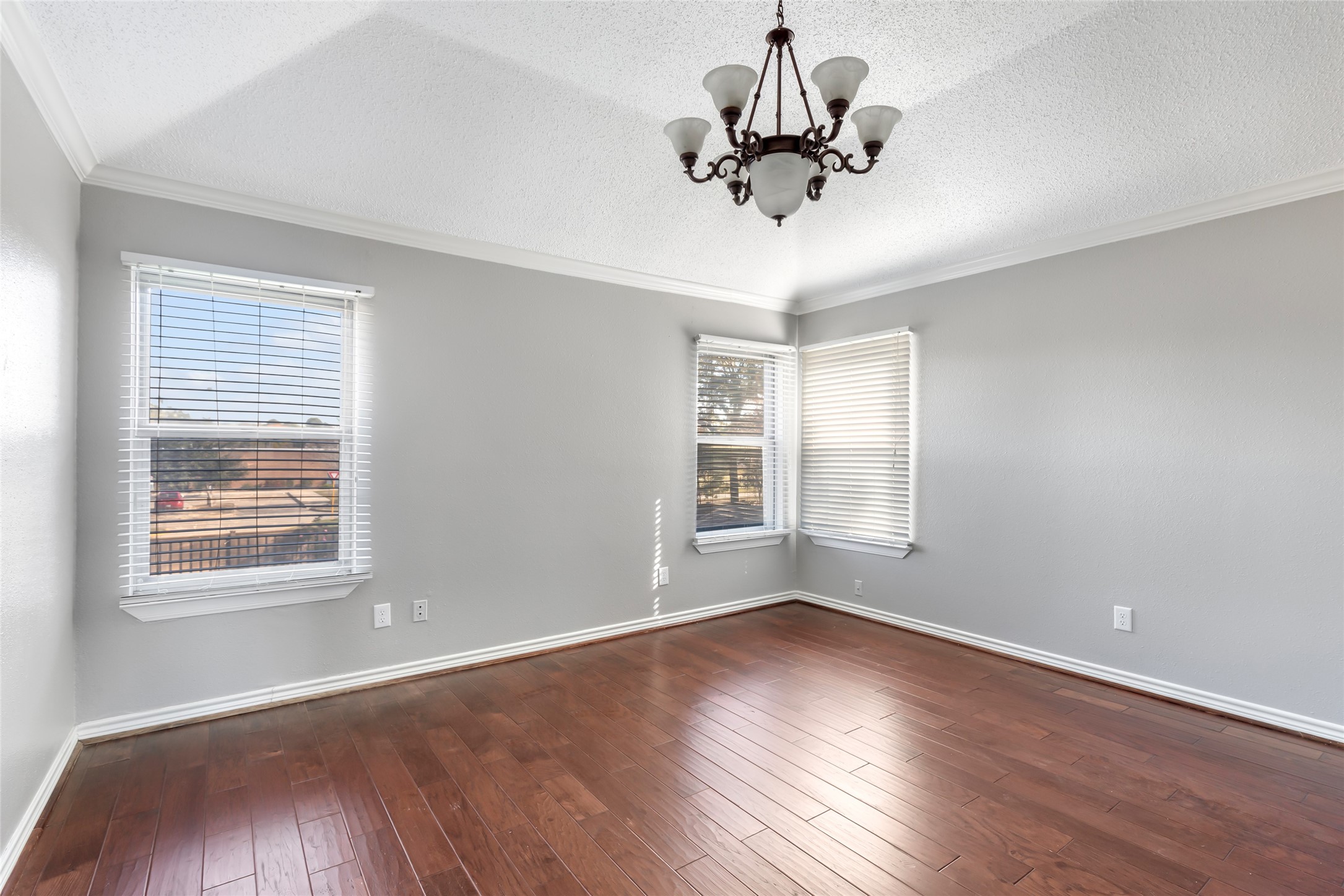 18910 Yaupon Trail Humble, TX 77346 - Photo 14 of 22 Master bedroom with wood flooring and vaulted ceiling