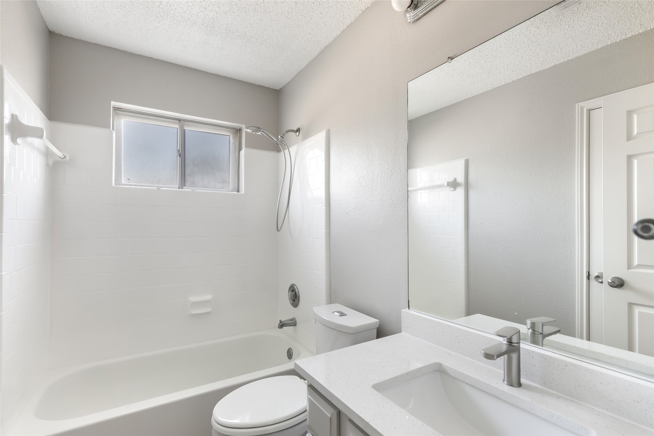 18910 Yaupon Trail Humble, TX 77346 - Photo 19 of 22 Bathroom 2 with linen closet, updated quartz countertops and refreshed cabinetry and shower area. (2nd floor)