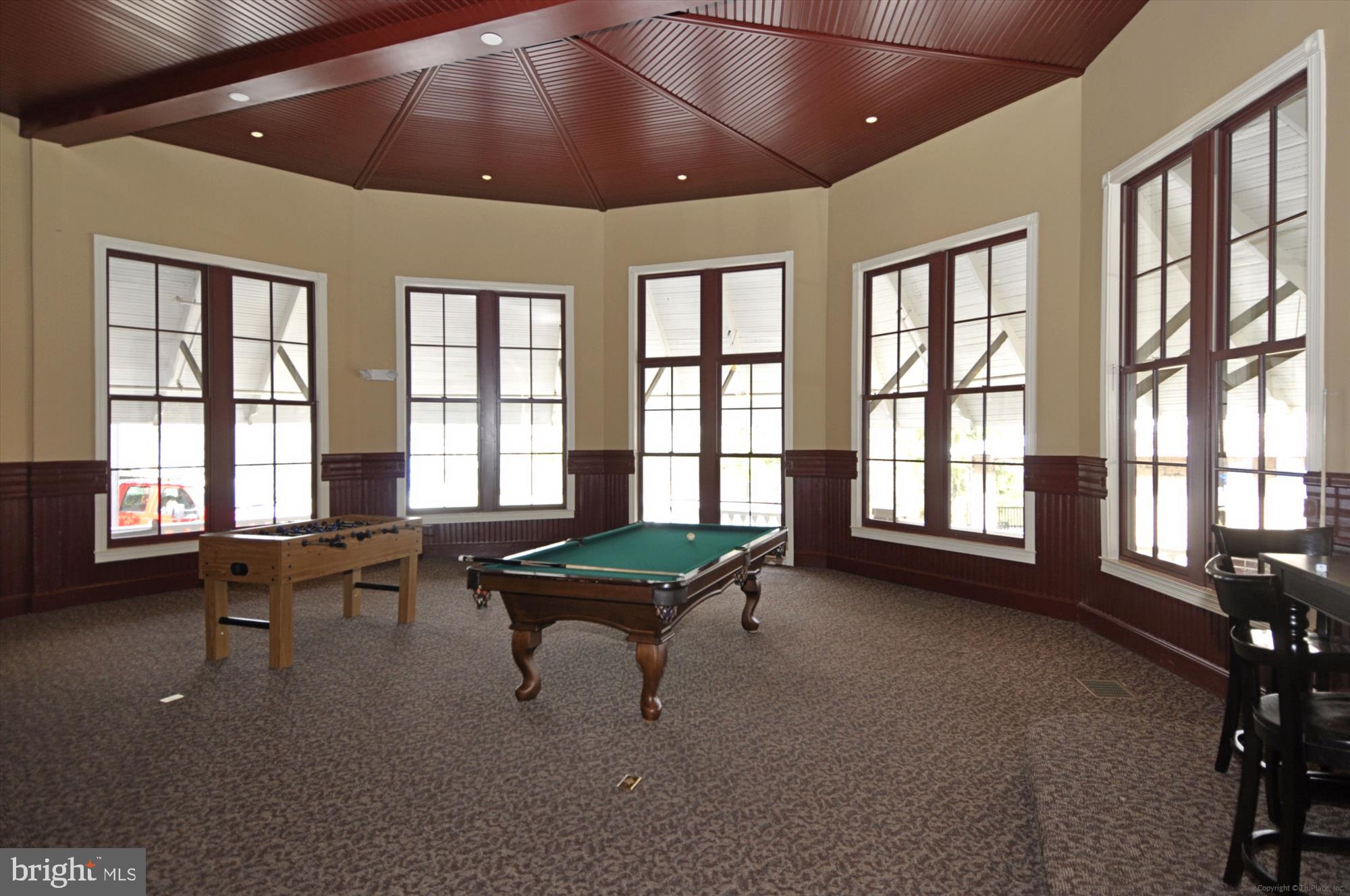 9610 Dewitt Drive, Unit PH410 Silver Spring, MD 20910 - Photo 39 of 64 a living room with furniture and a large window