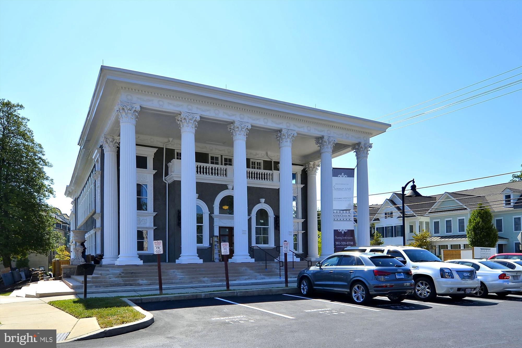 9610 Dewitt Drive, Unit PH410 Silver Spring, MD 20910 - Photo 41 of 64 a view of a car parked in front of a building