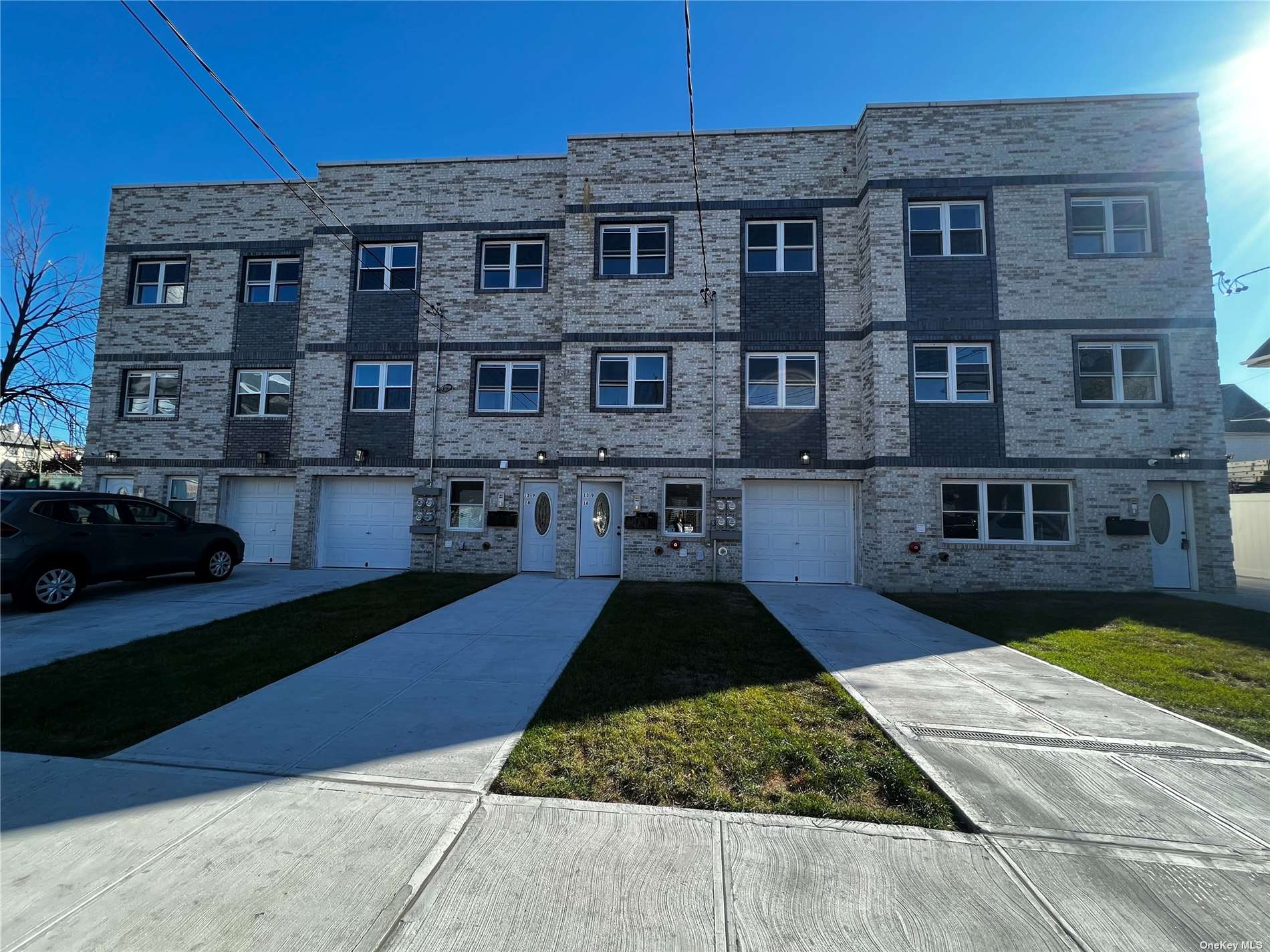 a front view of a house with yard