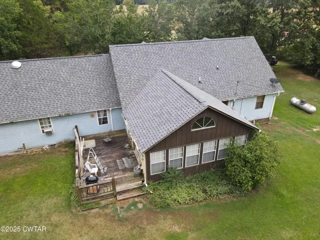 a aerial view of a house with garden