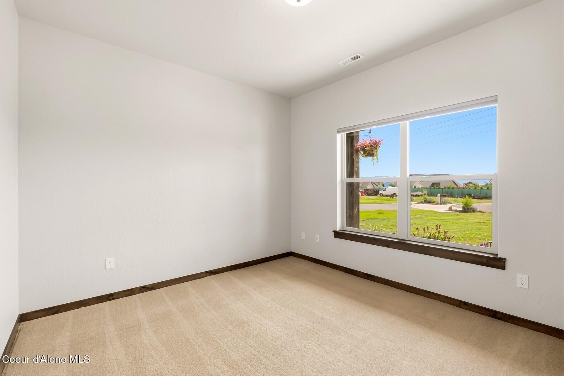 1317 Prominence Court Sandpoint, ID 83864 - Photo 23 of 44 Guest Bedroom #1