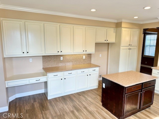 23636 Aquacate Road Corona, CA 92883 - Photo 20 of 74 a kitchen with granite countertop white cabinets and stainless steel appliances
