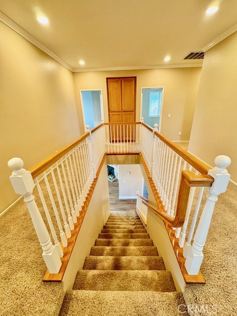 23636 Aquacate Road Corona, CA 92883 - Photo 37 of 74 a view of a hallway with wooden floor and staircase