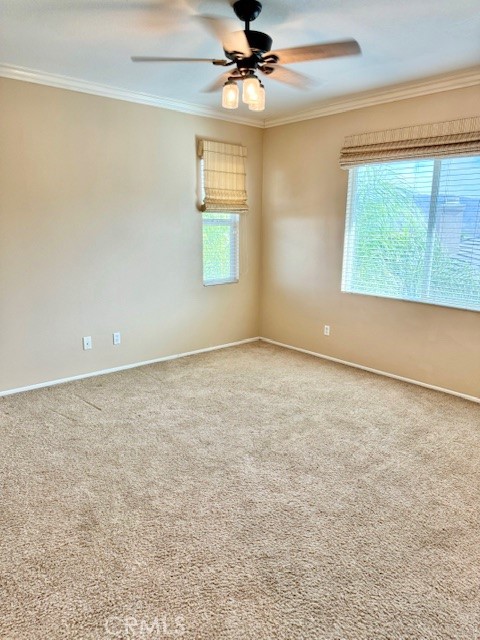 23636 Aquacate Road Corona, CA 92883 - Photo 48 of 74 an empty room with windows and fan