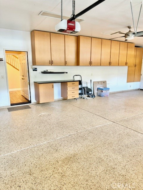 23636 Aquacate Road Corona, CA 92883 - Photo 56 of 74 a kitchen with stainless steel appliances wooden cabinets and a sink