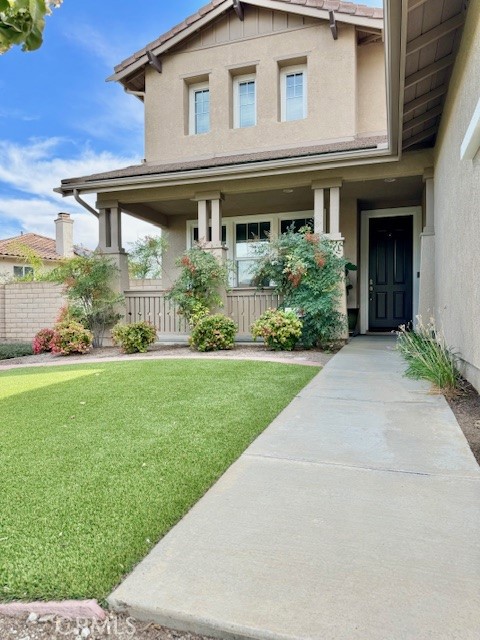 23636 Aquacate Road Corona, CA 92883 - Photo 6 of 74 front view of house with a yard