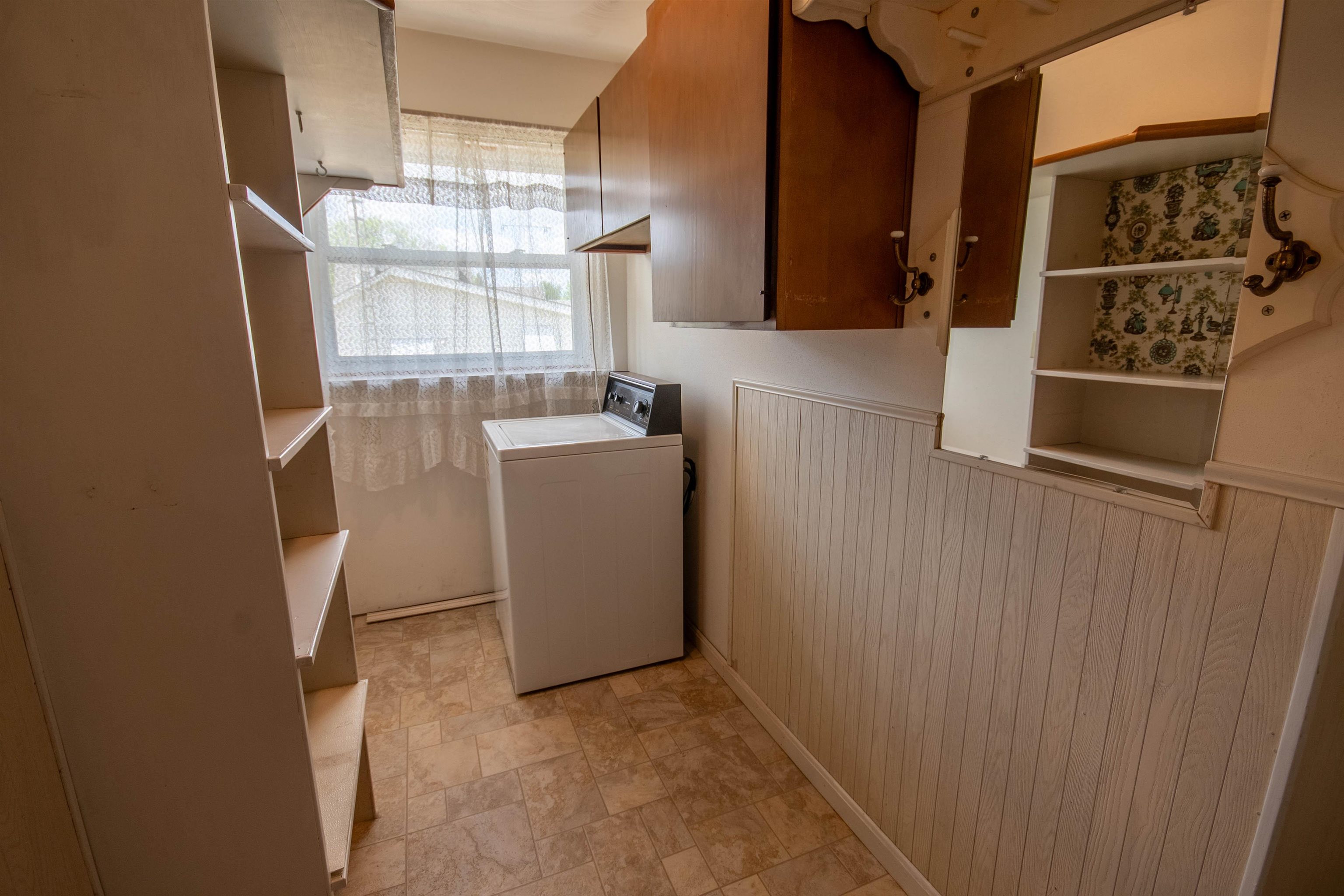 1839 West 1st Street Dixon, IL 61021 - Photo 13 of 44 a view of storage and utility room with washer and dryer