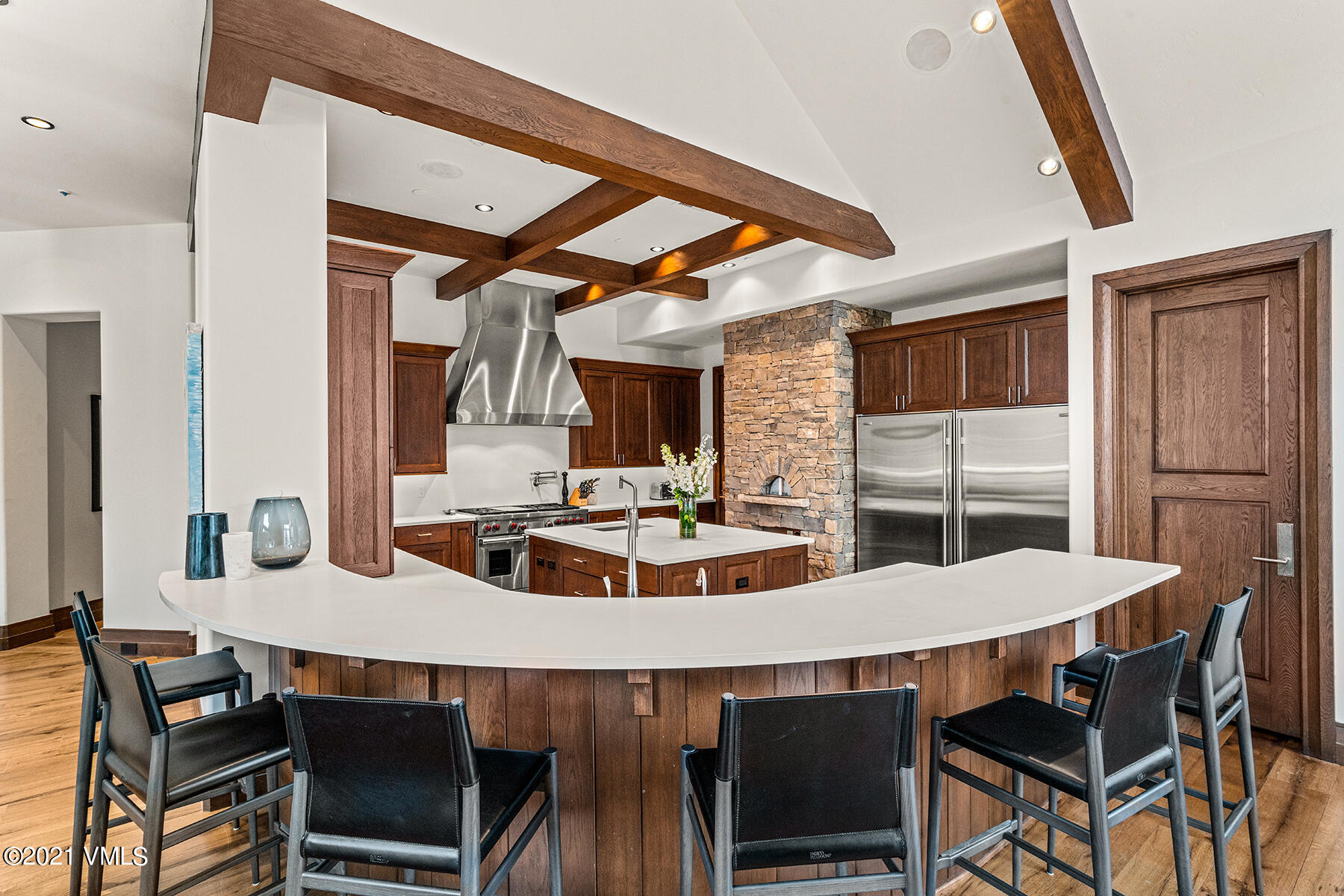 615 Forest Place Vail, CO 81657 - Photo 13 of 56 a view of a dining room with furniture and wooden floor